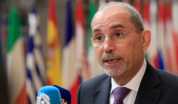 Jordan's Minister of Foreign Affairs Ayman Safadi speaks with the media as he arrives for a meeting at the European Council building in Brussels, on May 27, 2024. (AP)