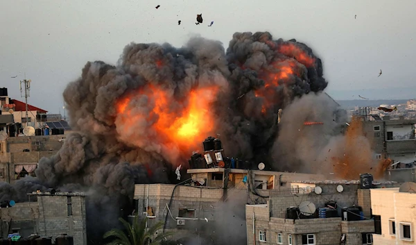 A ball of fire erupts from a building in Gaza City's Rimal residential district May 16, 2021. (AFP via Getty Images)