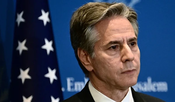 US Secretary of State Antony Blinken addresses a press conference in Tel Aviv during his week-long trip aimed at calming tensions across the Middle East, January 9, 2024. (AFP)