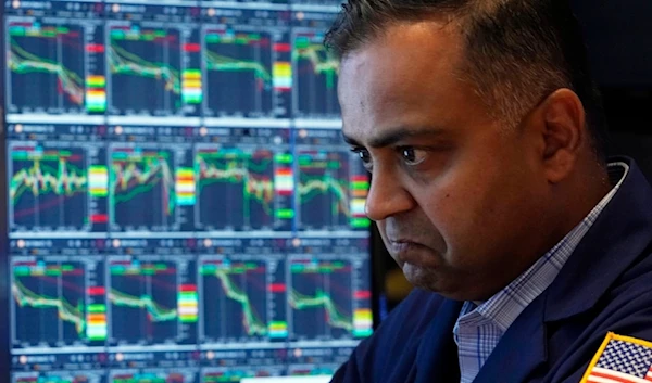 Specialist Dilip Patel works at his post on the floor of the New York Stock Exchange, Monday, Aug. 5, 2024. (AP)