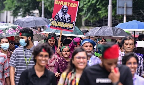 Activists take part in a protest march as they demand justice for victims arrested and killed in the recent countrywide violence in Dhaka on August 2, 2024. (AFP)