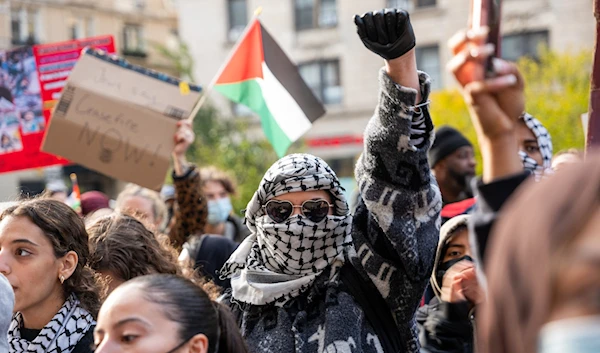 Pro-Palestinian demonstrators protesting against 'Israel's' genocide on Gaza near Columbia University in New York on November 15, 2023.(AFP)