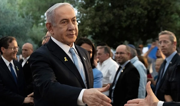 Israeli Prime Minister Benjamin Netanyahu attends the state memorial for Ze'ev Jabotinsky, at Mount Herzl Military Cemetery in al-Quds, Sunday, Aug. 4, 2024 (AP)