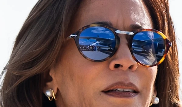 Air Force Two reflects in Democratic presidential nominee Vice President Kamala Harris' sunglasses at Detroit Metropolitan Wayne County Airport, Thursday, Aug. 8, 2024, in Wayne, Mich. (AP)