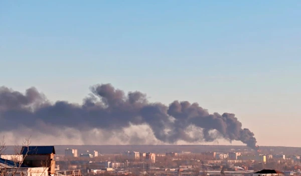 In this handout photo released by the administration of the Kursk region of Russia on Tuesday, Dec. 6, 2022, smoke rises from the area of Kursk airport outside Kursk, Russia. (AP)