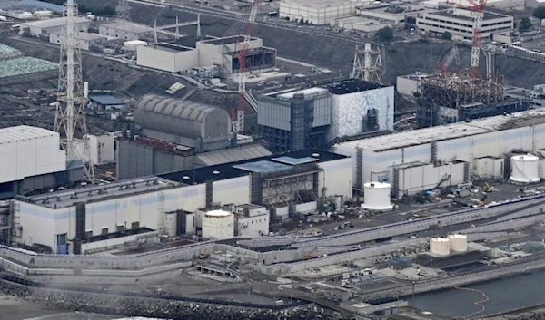 Fukushima begins operation to remove radioactive debris