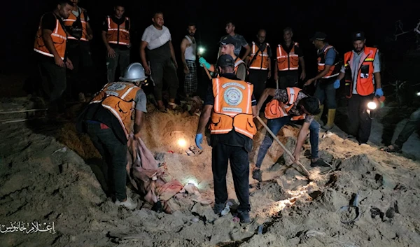 A Palestinian civil defense team conducts a search and rescue operation after the Israeli occupation bombed tents with advanced missiles on September 10, 2024. (Khan Younis media)