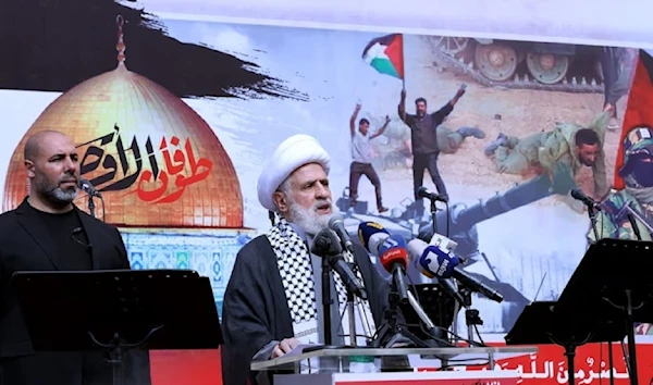 Hezbollah Deputy Secretary Naim Qassem gives a speech during a rally on October 13, 2023 (AFP)