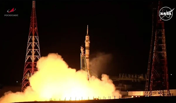 Russian Soyuz launches with two Russians, one American to the ISS