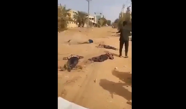 Screengrab from an undated video showing alleged RSF fighters executing Sudanese men (Social media)