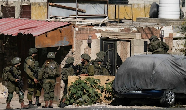 Israeli occupation forces soldiers are seen during an army raid in Tubas, West Bank, on Wednesday, September 11, 2024 (AP)