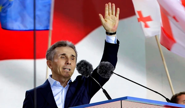 Bidzina Ivanishvili, leader of the Georgian Dream Party, greets demonstrators during a rally in support of "Russian law" in Tbilisi, Georgia, on April 29, 2024. (AP)