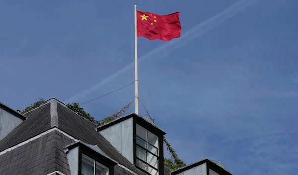 Chinese national flag is raised at the Chinese embassy in London, United Kingdom, Sept. 11, 2023. (AP)