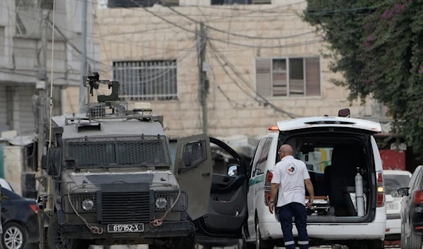 •	The Israeli occupation forces invading Jenin forcefully searched a PRC ambulance during the wide-scale aggression against the West Bank, Palestine, Aug. 28, 2024. (AP)