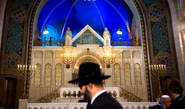 In this Friday, Nov. 9, 2018 file photo a rabbi arrives at the synagogue Rykestrasse in the district Prenzlauer Berg in Berlin. (AP)