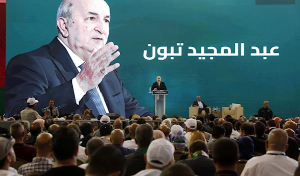 Algerian president Abdelmajid Tebboune delivers a speech during his campaign for the upcoming presidential election, in Oran, Algeria, Sunday, Aug. 26, 2024. (AP)