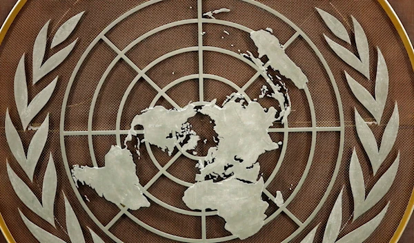 The logo of the United Nations is seen at the General Assembly hall at U.N. headquarters, Tuesday, Sept. 21, 2021. (AP)