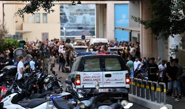 An ambulance transports the wounded to the American University of Beirut Medical Center after the explosion of the pagers, September 17 (AFP)