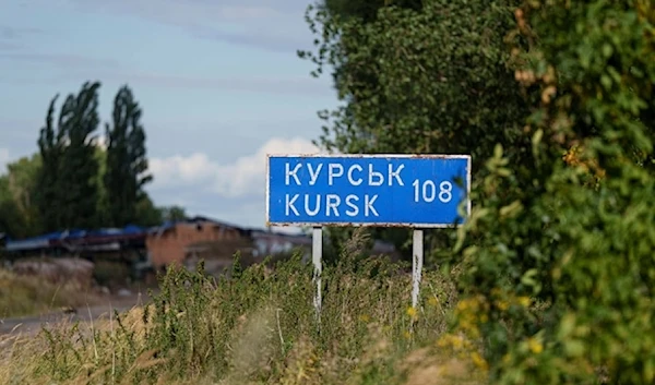 A plate with a sign Kursk 108 km is seen on the Russian-Ukrainian border in the Sumy region, Ukraine Tuesday, August 13,2024. (AP)