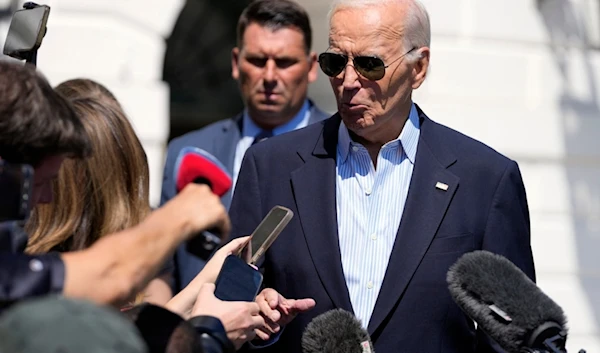 President Joe Biden talks with reporters as he walks out of the White House to board Marine One on the South Lawn in Washington, Monday, Sept. 2, 2024. (AP)