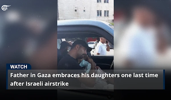 Father in Gaza embraces his daughters one last time after Israeli airstrike