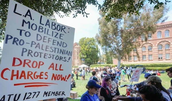 UCLA workers, students, and supporters get lunch after a rally at Royce Quad in the University of California, Los Angeles, UCLA campus, on Tuesday, May 28, 2024. (AP)