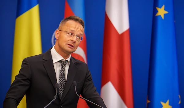 Hungary's Foreign Minister Peter Szijjarto grimaces during a joint press conference in Bucharest, Romania, on September 3, 2024. (AP)