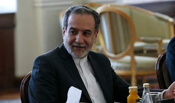 Iranian Foreign Minister Abbas Araghchi attends a meeting with Qatari Prime Minister and Foreign Minister Sheikh Mohammed bin Abdulrahman Al Thani, in Tehran, Iran, on August 26, 2024. (AP)