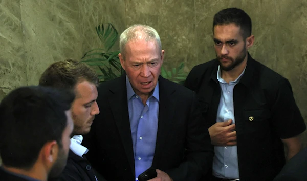 Israel's Defence Minister Yoav Galant, center, arrives to attend the weekly cabinet meeting at the prime minister's office in occupied al-Quds, 'Israel', on July 9, 2023. (AP)