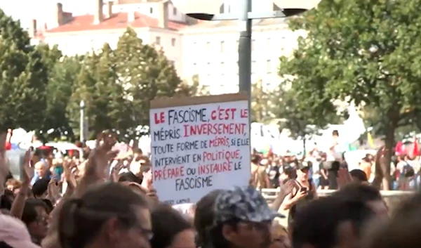 Thousands protest in France, demand Macron resign