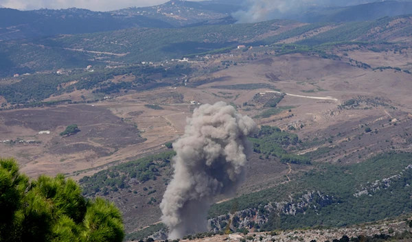 Smoke rises from an Israeli airstrike on a valley near Marjayoun town, south Lebanon, on September 21, 2024. (AP)