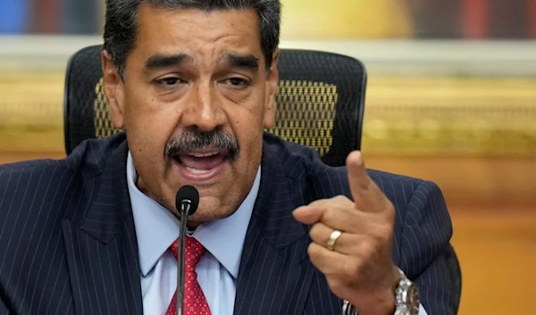 Venezuelan President Nicolas Maduro holds a news conference at the Miraflores presidential palace in Caracas, Venezuela, July 31, 2024. (AP)