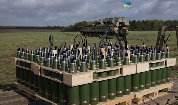 Ammunition are placed as Ukrainian soldiers take part in a military exercise at a military training camp in an undisclosed location in England, on March 24, 2023. (AP)