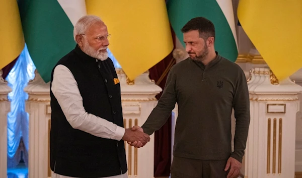 Indian Prime Minister Narendra Modi, left, meets with Ukrainian President Volodymyr Zelenskyy in Kyiv, Ukraine, on Friday, Aug. 23, 2024. (AP Photo/Efrem Lukatsky)