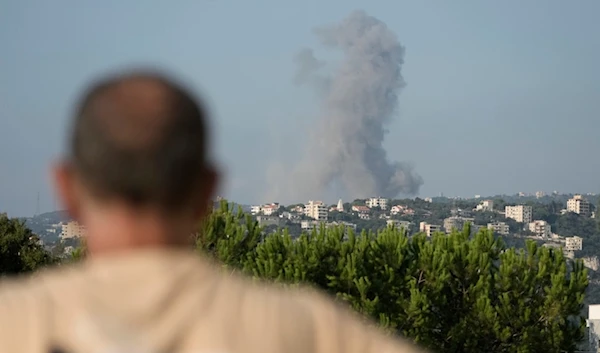 Smoke rises from an Israeli airstrike north of Beirut, in the village of Ras al-Usta, Byblos district, seen from Maaysrah, Lebanon, Wednesday, September 25, 2024 (AP)