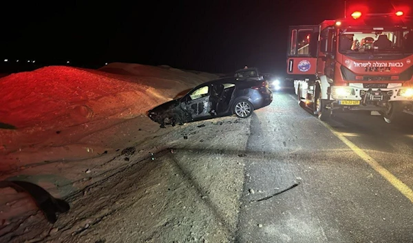 A car swerves and crashes on the side of the road as sirens blast in Tel Aviv, September 27, 2024 (Social Media)