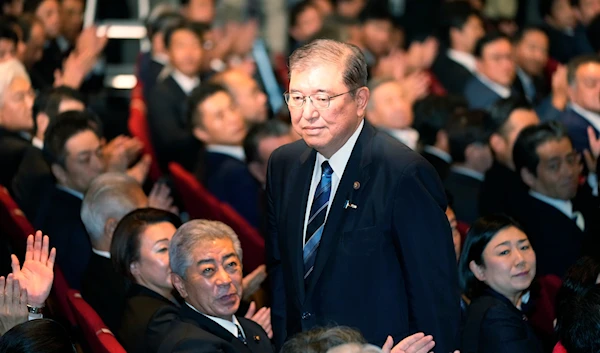 Shigeru Ishiba, center, acknowledges after he was elected as new head of Japan's ruling Liberal Democratic Party (LDP) during the party's leadership election on September 27, 2024, in Tokyo. (AP)