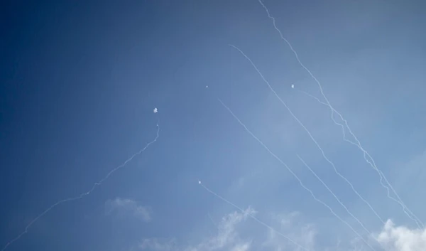 The Iron Dome air defense system fires to intercept rockets launched from Lebanon, as seen from Haifa, Sept. 27, 2024. (AP) )