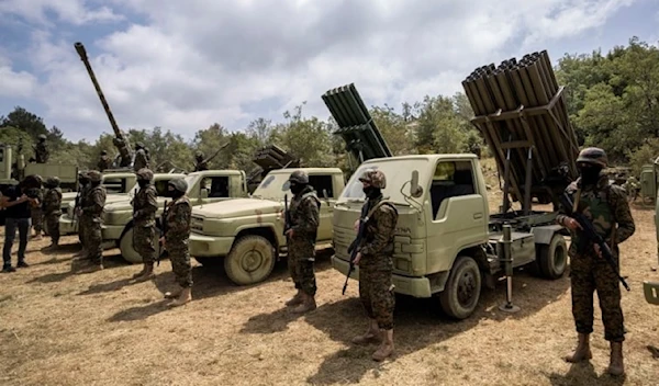 Fighters from the Lebanese Hezbollah carry out a training exercise in Aaramta village in the Jezzine District, southern Lebanon, May 21, 2023 (AP)