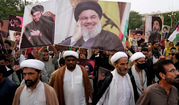 Shiite Muslims shout anti-Zionist and anti-US slogans during a protest against the martyrdom of Hezbollah leader Hassan Nasrallah, Sunday, Sept. 29, 2024, in Lahore, Pakistan. (AP)