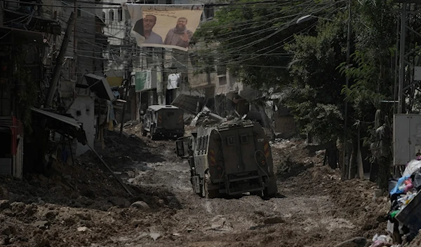 A convoy of Israeli military armored vehicles is seen during an army raid in Tulkarem, West Bank, on September 3, 2024. (AP)