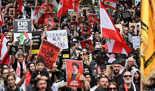 Protesters gather to mourn the martyrdom of Hezbollah leader Sayyed Hassan Nasrallah at a rally in Sydney on Sunday. (AFP/Getty Images)