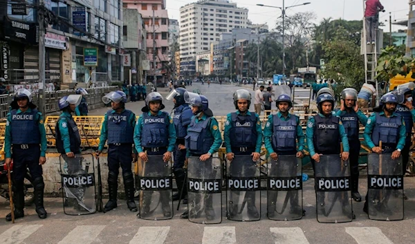 Police set up a roadblock near the Bangladesh Nationalist Party's central office in Dhaka, Bangladesh, on December 8, 2022.(AFP)