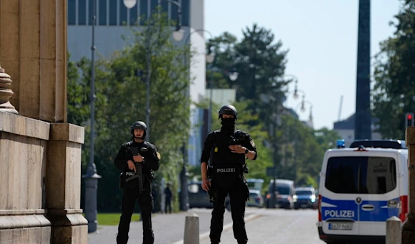 Police officers stand guard after police fired shots at a suspicious person near the Israeli Consulate and a museum in Munich, Germany, Thursday, September 5, 2024 (AP)