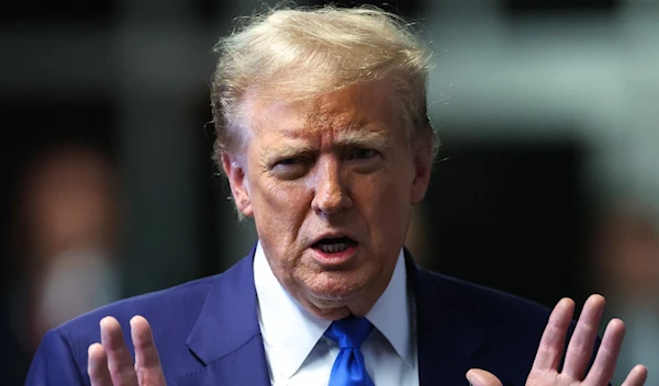 Republican presidential candidate and former US president Donald Trump speaks to reporters at the end of the day's proceedings in his criminal trial at the New York State Supreme Court in New York City, on May 3, 2024. (AFP)