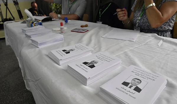 Ballots showing presidential candidates inside a polling station during the presidential election, Saturday, Sept. 7, 2024, in Algiers, Algeria. (AP Photo/Fateh Guidoum)