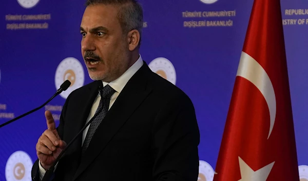 Turkey's Foreign Minister, Hakan Fidan, answers questions from media members during a press conference in Istanbul, Turkey, on January 10, 2025. (AP)