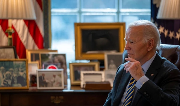 President Joe Biden listens during a briefing regarding the federal response to the spread of wildfires in the Los Angeles area, Friday, Jan. 10, 2025, in the Oval Office at the White House in Washington (AP)