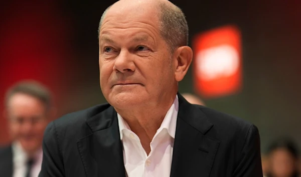 German Chancellor Olaf Scholz attends a special party convention in Berlin, Germany, Saturday, Jan. 11, 2025. (AP Photo/Markus Schreiber)