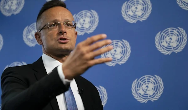 Hungarian Foreign Minister Peter Szijjarto speaks during an interview with the AP at the United Press headquarters, Thursday September 23, 2021 during the 76th Session of the UN General Assembly in New York (AP)